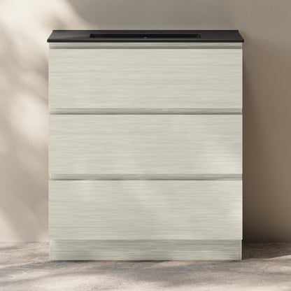 Swiss Madison, Liberte 30" Freestanding Bathroom Vanity in White Oak with Black 3-Hole Widespread Sink Top