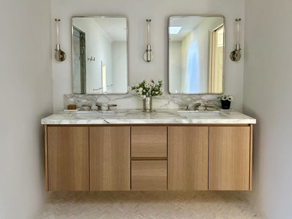 Gilded floating bath vanity, styled bathroom